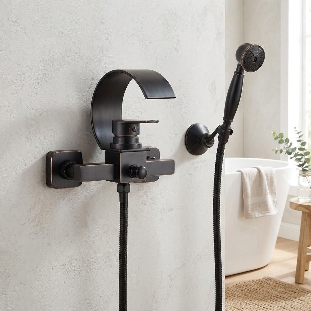 Lagomel waterfall single-handle wall-mount tub filler in oil-rubbed bronze, chrome, set in a Modern/Contemporary bathroom