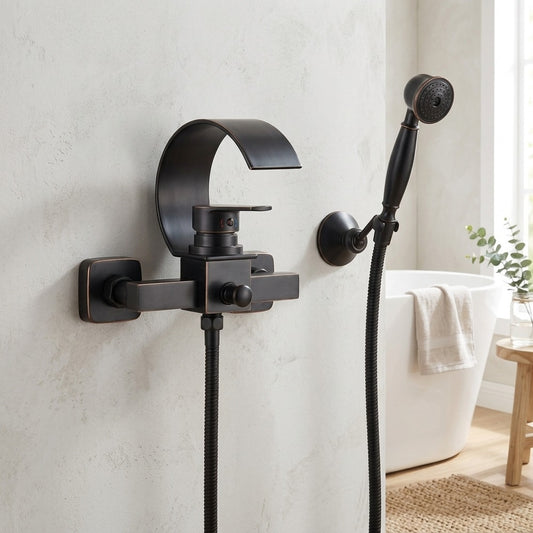 Lagomel waterfall single-handle wall-mount tub filler in oil-rubbed bronze, chrome, set in a Modern/Contemporary bathroom
