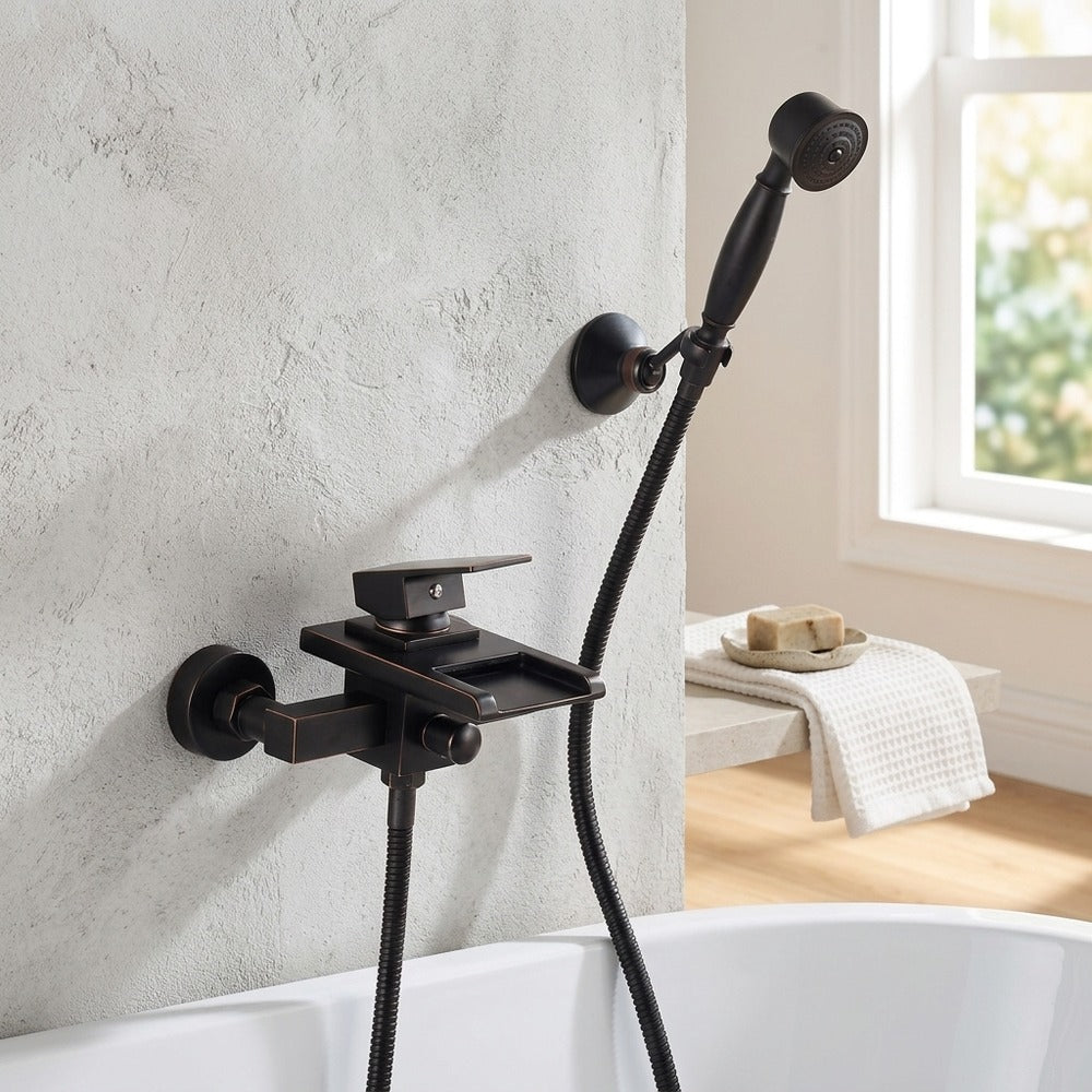Lagomel waterfall single-handle wall-mount tub filler, set in a Modern/Minimalist bathroom