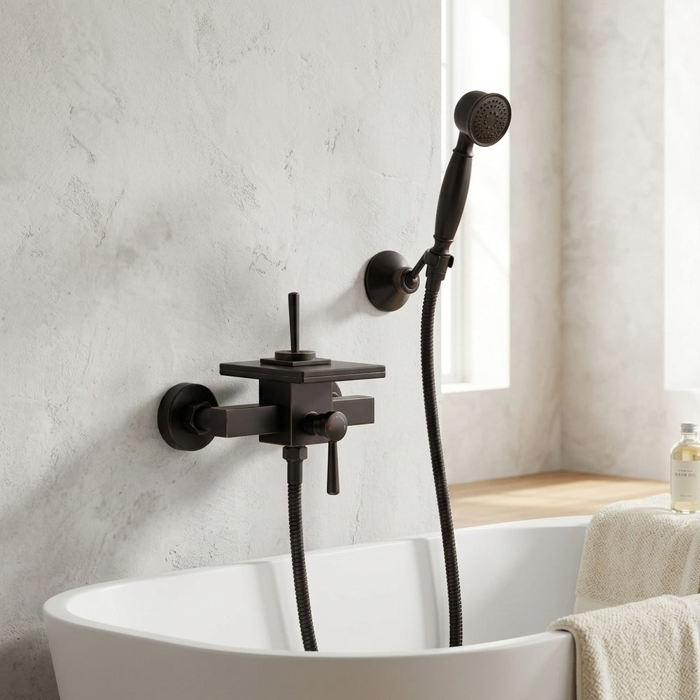 Lagomel waterfall single-handle wall-mount tub filler, set in a Modern/Minimalist bathroom