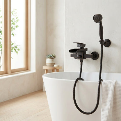 Lagomel waterfall single-handle wall-mount tub filler, set in a Modern/Minimalist bathroom