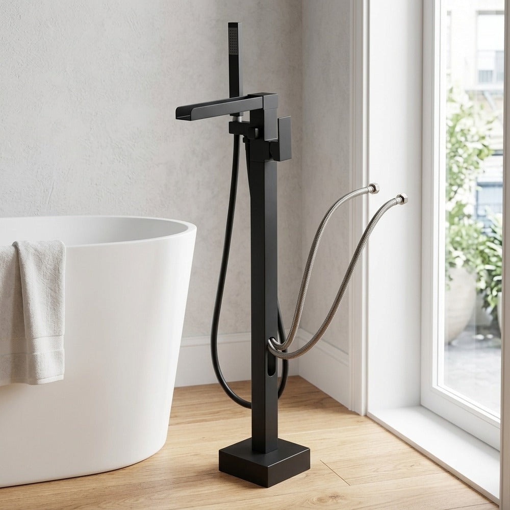 Lagomel waterfall single-handle freestanding tub filler, set in a Modern/Minimalist bathroom