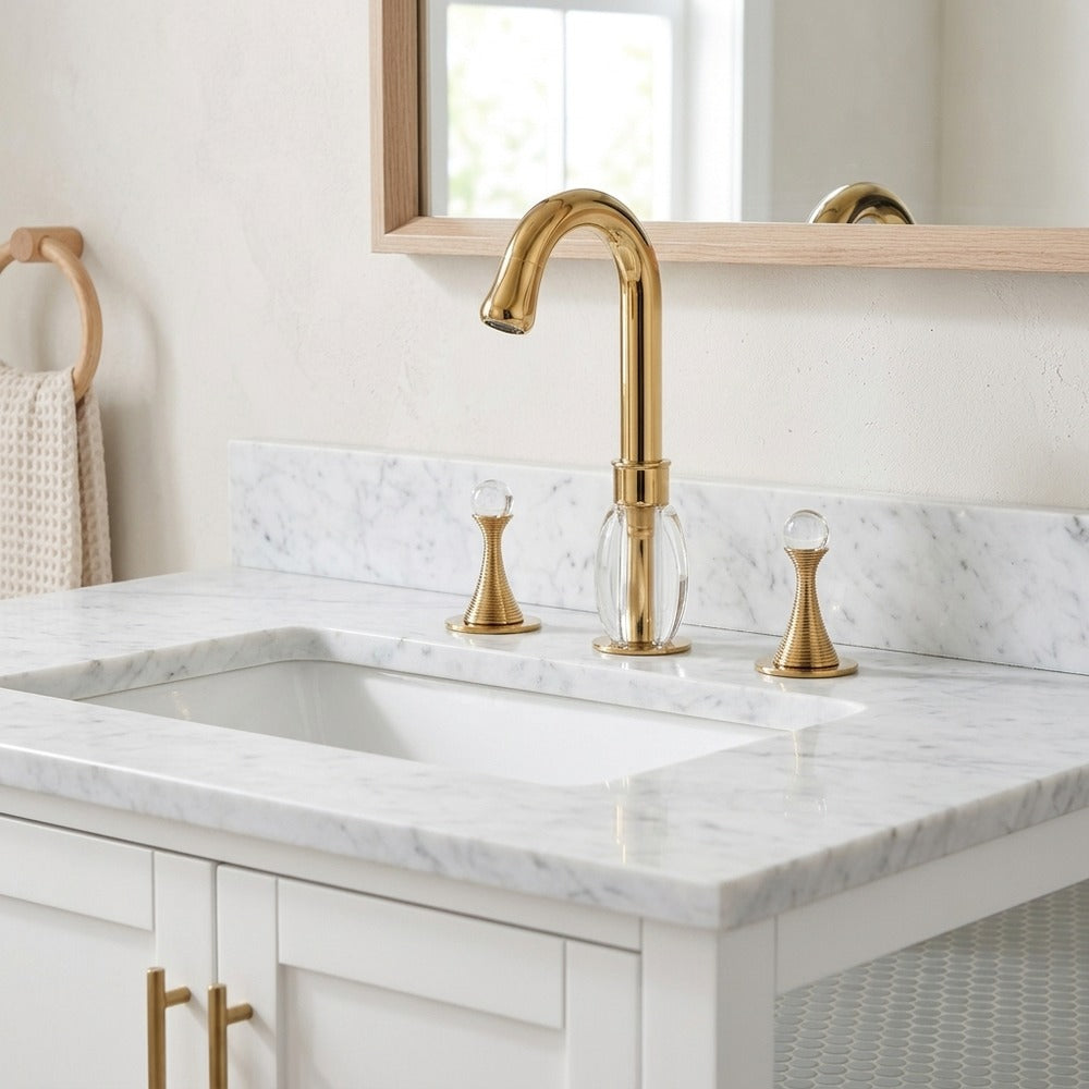 Lagomel widespread bathroom faucet in polished gold, set in a Modern/Contemporary bathroom