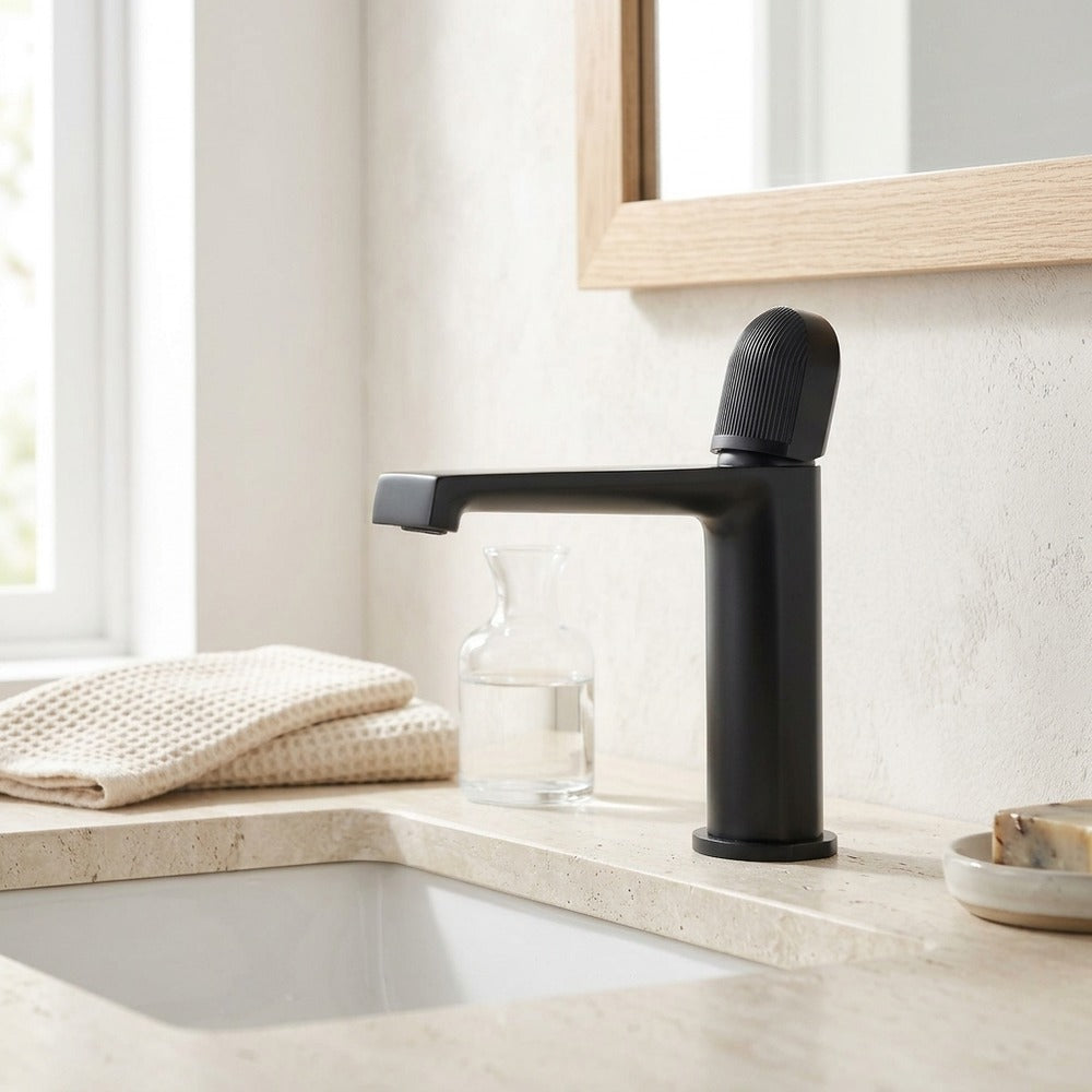 Lagomel waterfall single-hole bathroom faucet in matte black, gunmetal, matte white, chrome, brushed gold, set in a Modern/Contemporary bathroom
