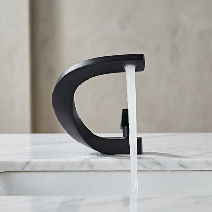 Lagomel waterfall single-hole bathroom faucet, set in a Modern/Minimalist bathroom