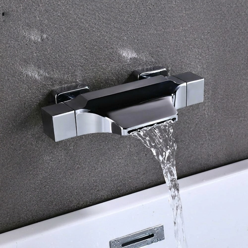 Lagomel waterfall wall-mount tub filler, set in a Modern/Contemporary bathroom