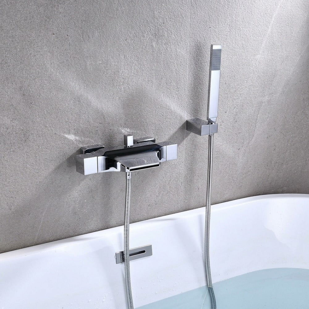 Lagomel waterfall wall-mount tub filler, set in a Modern/Contemporary bathroom