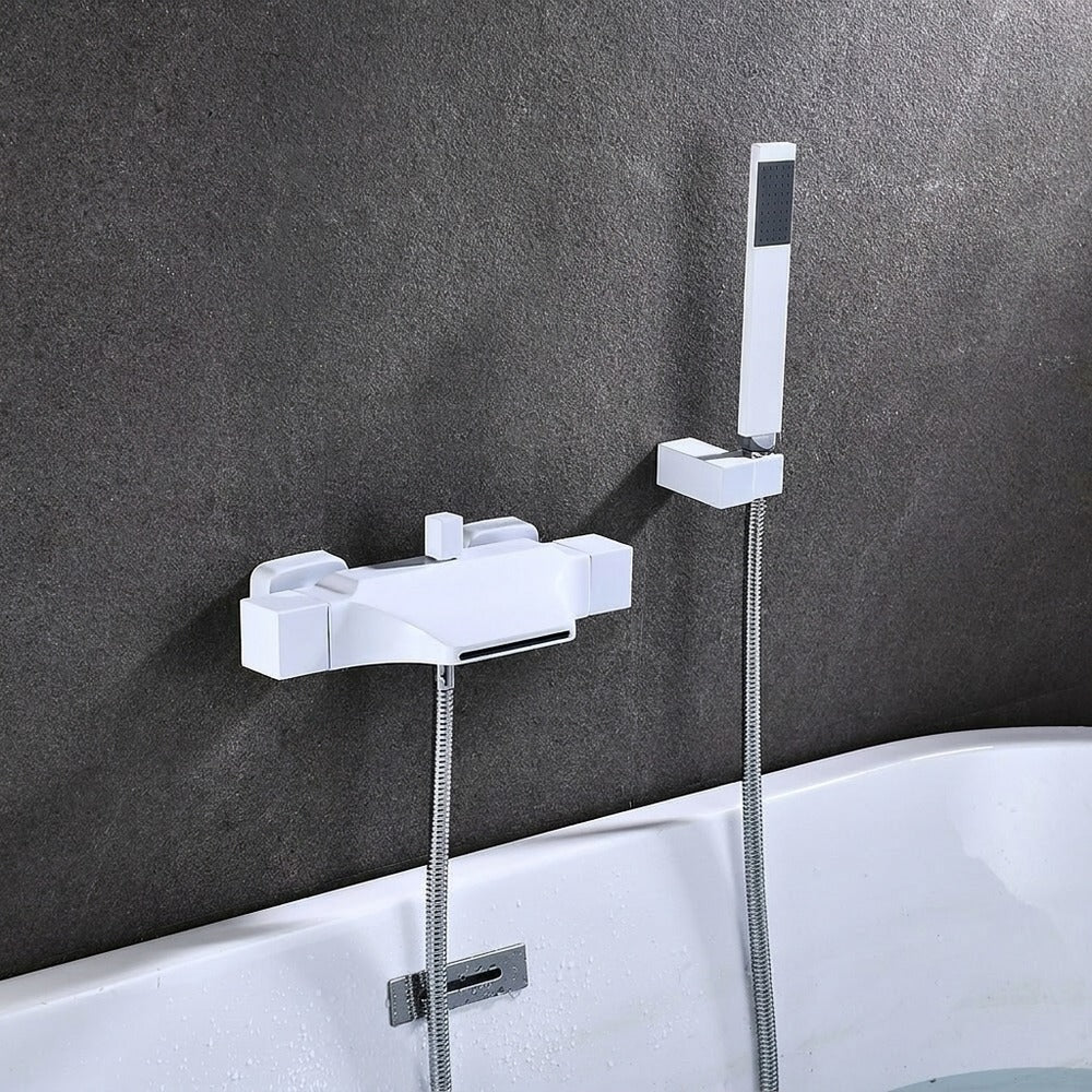 Lagomel waterfall wall-mount tub filler, set in a Modern/Contemporary bathroom