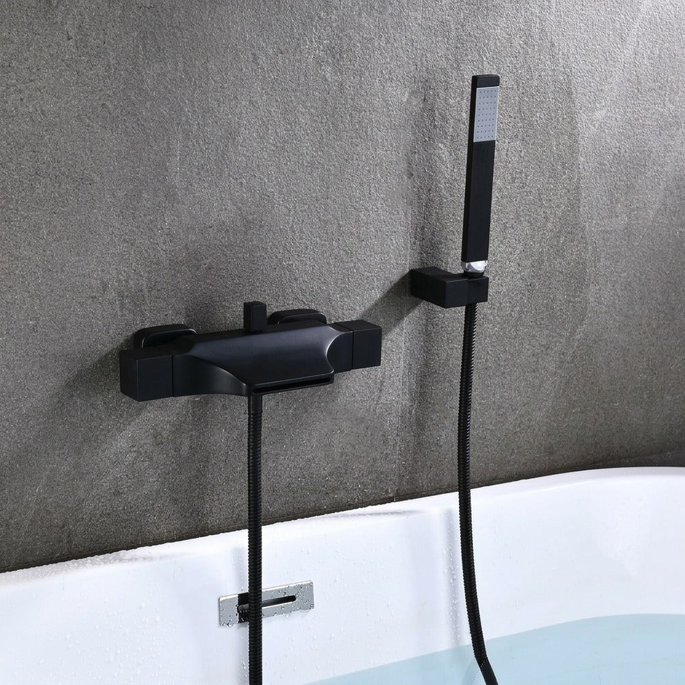 Lagomel waterfall wall-mount tub filler, set in a Modern/Contemporary bathroom