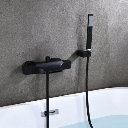 Lagomel waterfall wall-mount tub filler, set in a Modern/Contemporary bathroom