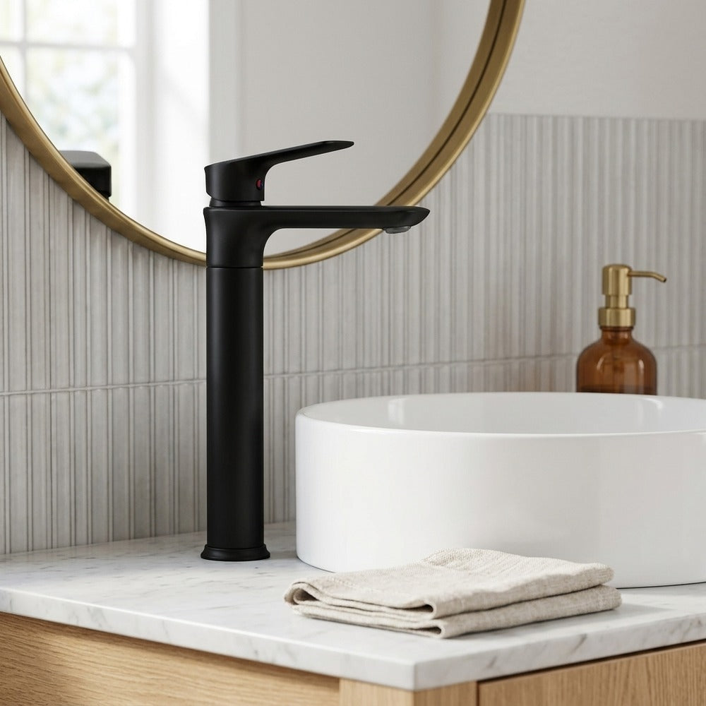 Lagomel single-hole single-handle vessel sink faucet in matte black, set in a Modern/Contemporary bathroom