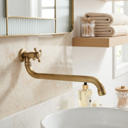 Lagomel wall-mount bathroom faucet in antique brass, set in a Traditional/Classic/Vintage/Retro bathroom
