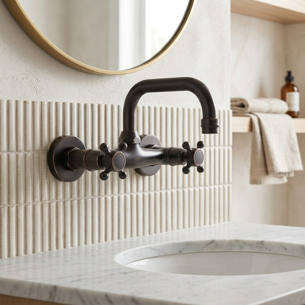Lagomel double-handle wall-mount bathroom faucet in oil-rubbed bronze, set in a Vintage/Retro/Traditional/Classic bathroom