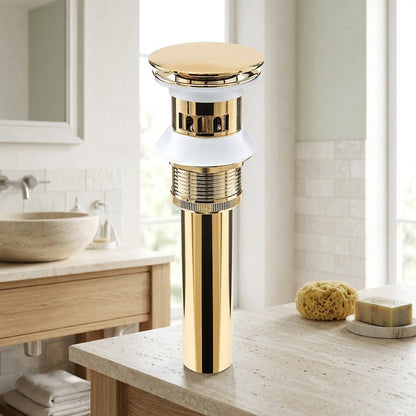 Lagomel bathroom sink drain in polished gold, set in a Contemporary bathroom