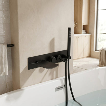 Lagomel waterfall wall-mount tub filler, set in a Modern/Contemporary bathroom