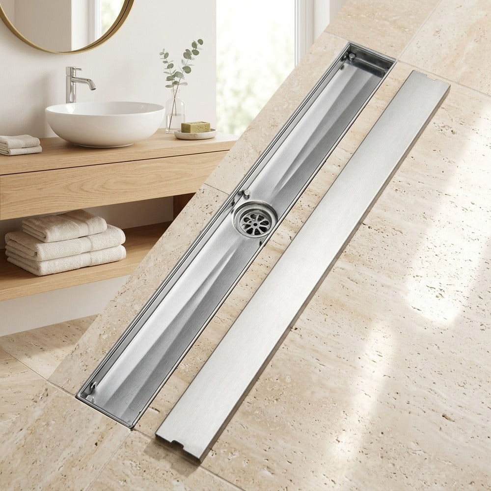 Lagomel linear floor drain in stainless steel, set in a Modern bathroom