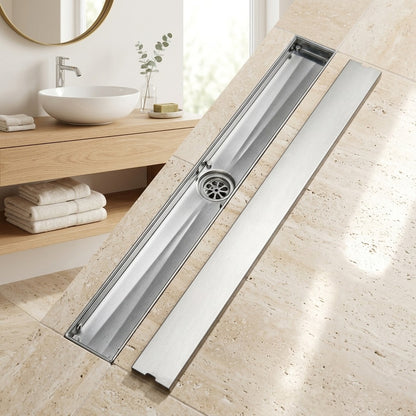 Lagomel linear floor drain in stainless steel, set in a Modern bathroom