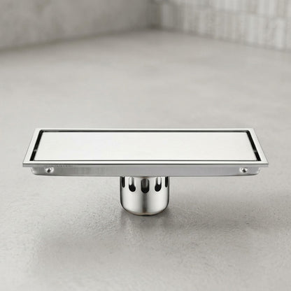 Lagomel linear floor drain, set in a Modern bathroom