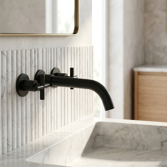 Lagomel wall-mount bathroom faucet in matte black, chrome, antique brass, brushed gold, brushed nickel, matte white, set in a Modern/Vintage/Retro bathroom