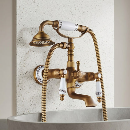 Lagomel wall-mount tub filler in antique brass, set in a Traditional/Classic/Vintage/Retro bathroom