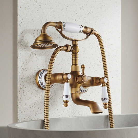 Lagomel wall-mount tub filler in antique brass, set in a Traditional/Classic/Vintage/Retro bathroom