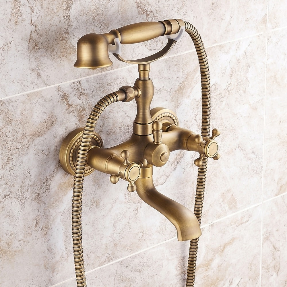 Lagomel double-handle wall-mount tub filler in antique brass, matte black, set in a Traditional/Classic/Vintage/Retro bathroom