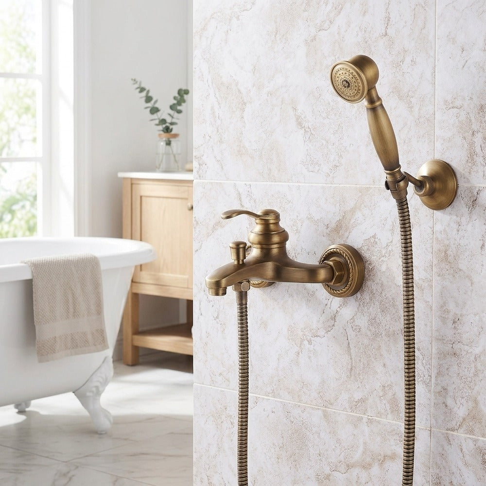 Lagomel single-handle wall-mount tub filler in antique brass, set in a Traditional/Classic/Vintage/Retro bathroom