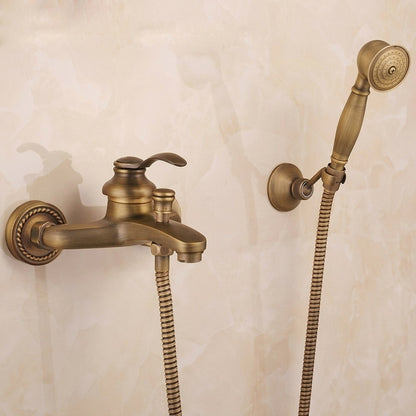 Lagomel single-handle wall-mount tub filler in antique brass, set in a Traditional/Classic/Vintage/Retro bathroom
