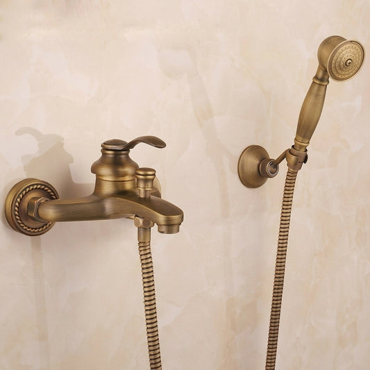 Lagomel single-handle wall-mount tub filler in antique brass, set in a Traditional/Classic/Vintage/Retro bathroom