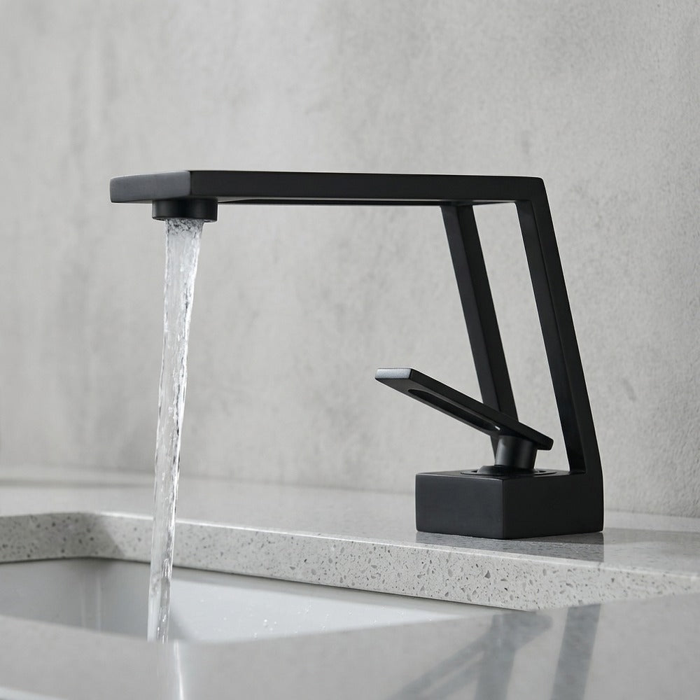 Lagomel single-hole bathroom faucet in matte black, brushed gold, two-tone / mixed finish, set in a Contemporary bathroom