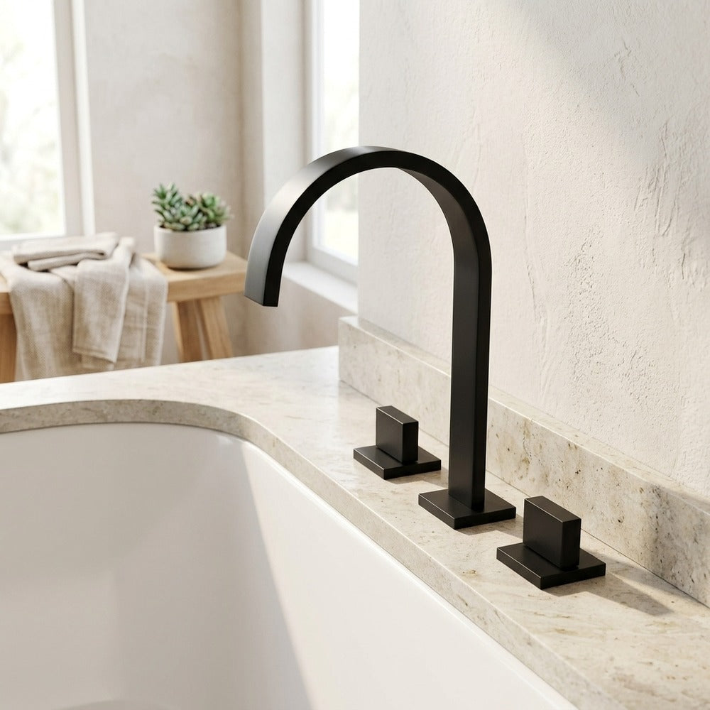 Lagomel waterfall deck-mount tub filler in matte black, chrome, set in a Modern/Contemporary bathroom