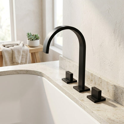Lagomel waterfall deck-mount tub filler in matte black, chrome, set in a Modern/Contemporary bathroom