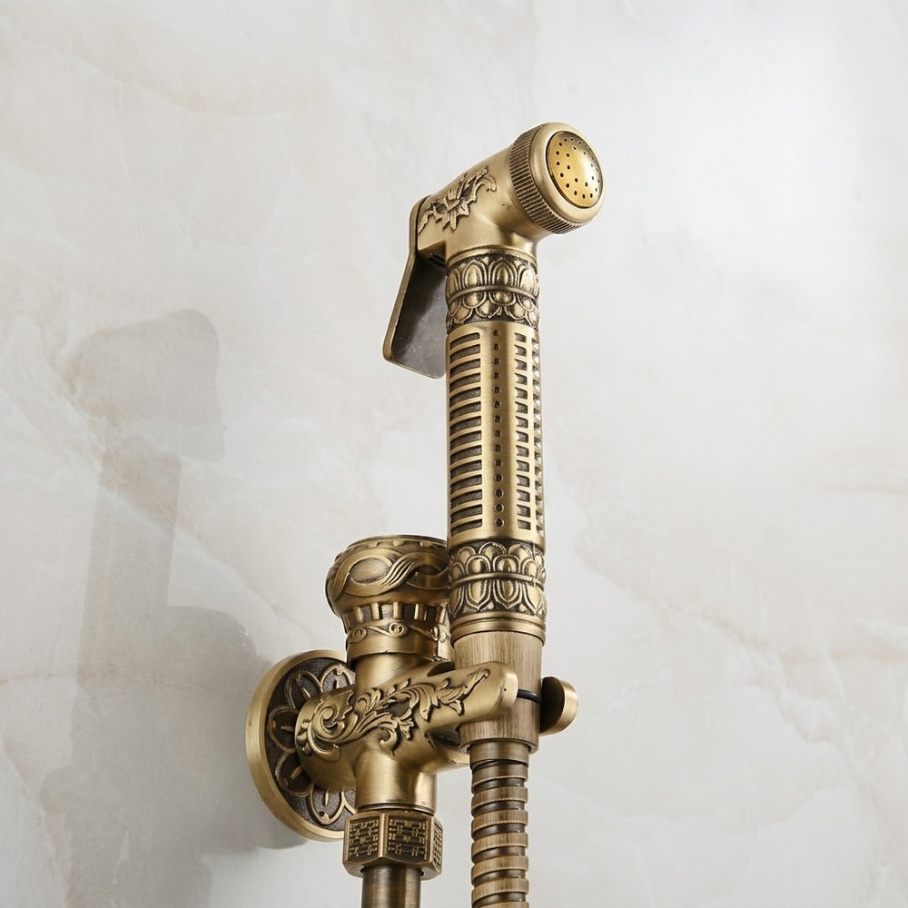 Lagomel wall-mounted bidet faucet in antique brass, set in a Traditional/Classic/Vintage/Retro bathroom