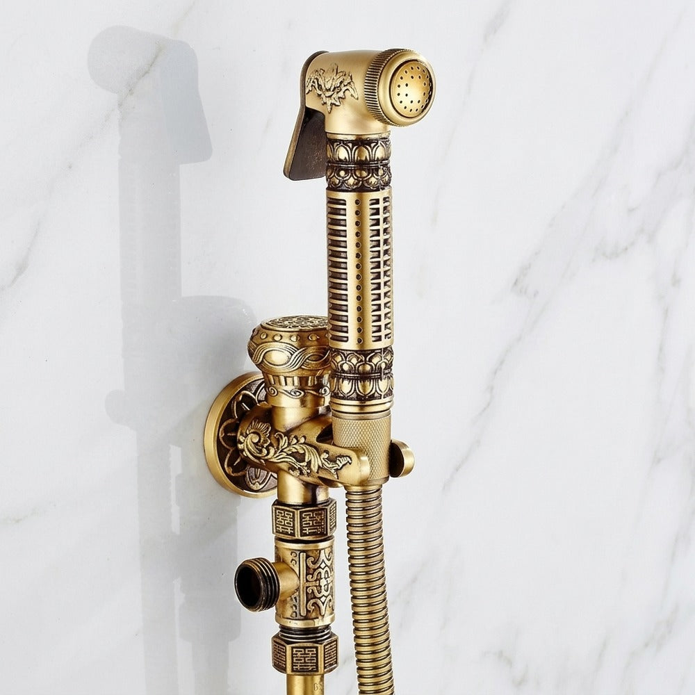Lagomel wall-mounted bidet faucet in antique brass, set in a Traditional/Classic/Vintage/Retro bathroom