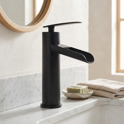 Lagomel waterfall single-hole bathroom faucet, set in a Modern/Minimalist bathroom
