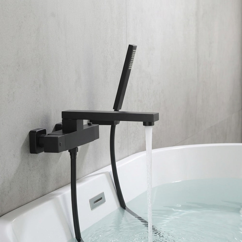 Lagomel wall-mount tub filler in matte black, set in a Modern/Contemporary bathroom
