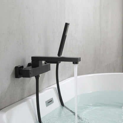 Lagomel wall-mount tub filler in matte black, set in a Modern/Contemporary bathroom