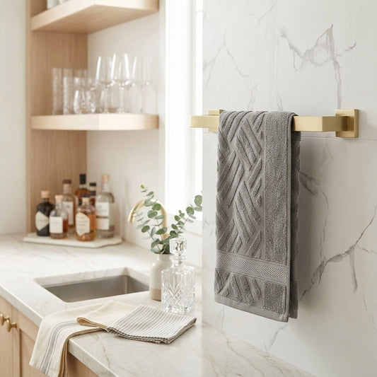 Lagomel wall-mounted towel bar in chrome, brushed gold, matte black, brushed nickel, set in a Modern/Contemporary bathroom