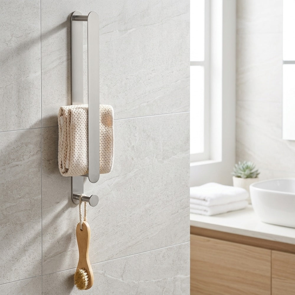 Lagomel wall-mounted towel bar, set in a Modern/Contemporary bathroom