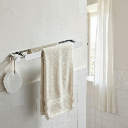 Lagomel wall-mounted towel bar, set in a Modern/Contemporary bathroom