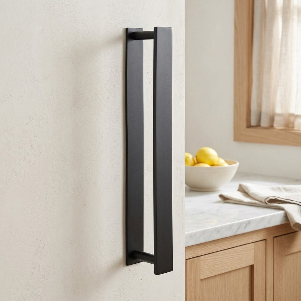 Lagomel wall-mounted towel bar, set in a Modern/Contemporary bathroom