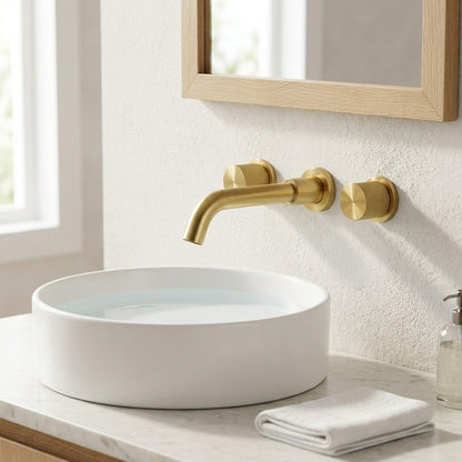 Lagomel wall-mount bathroom faucet in brushed gold, set in a Modern/Contemporary bathroom