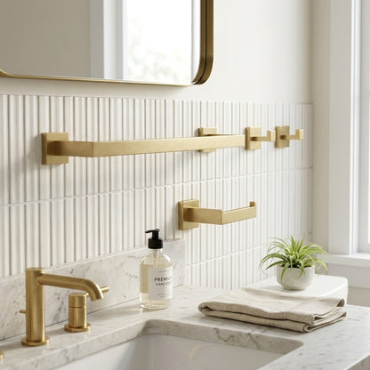 Lagomel wall-mounted bathroom hardware set in brushed gold, set in a Modern/Contemporary bathroom
