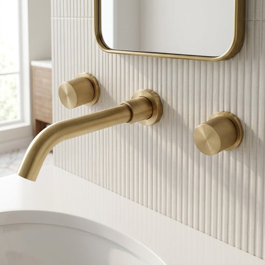 Lagomel wall-mount bathroom faucet in brushed gold, set in a Modern/Contemporary bathroom