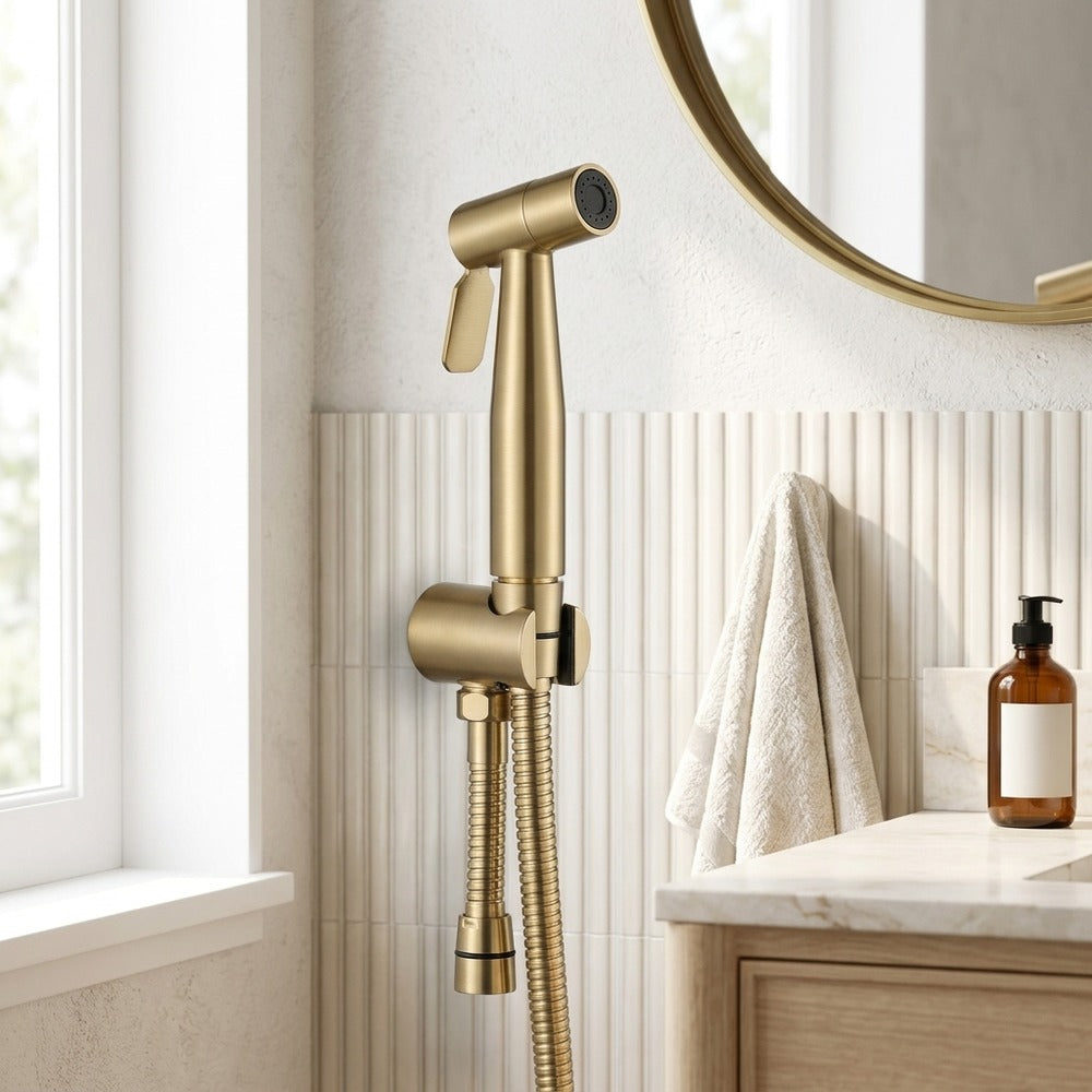 Lagomel bidet faucet in brushed gold, set in a Contemporary bathroom