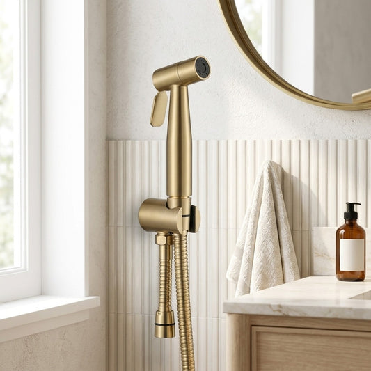 Lagomel bidet faucet in brushed gold, set in a Contemporary bathroom