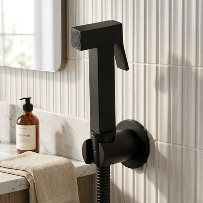 Lagomel wall-mounted bidet faucet in matte black, chrome, brushed gold, set in a Contemporary bathroom