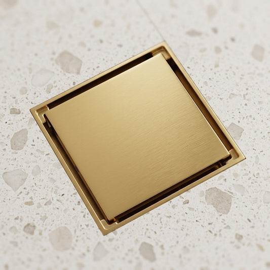 Lagomel square floor drain in antique brass, brushed gold, brushed nickel, chrome, matte black, rose gold,, set in a Modern/Contemporary bathroom