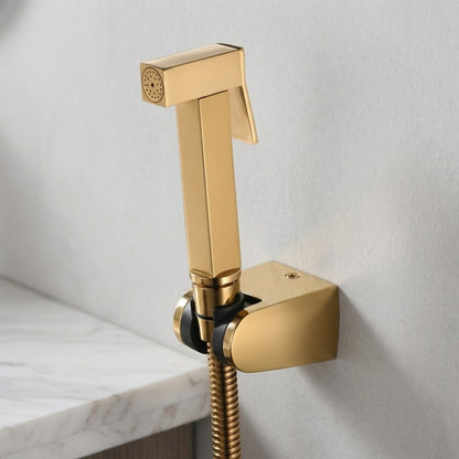 Lagomel single-handle bidet faucet in polished gold, pvd, set in a Contemporary/Modern bathroom