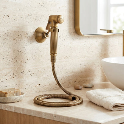 Lagomel wall-mounted single-handle bidet faucet in antique brass, brushed gold, matte black, set in a Vintage/Retro bathroom
